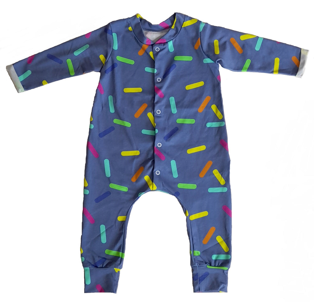 Confetti Romper by Little Loves Cornwall, slate blue with multicolour confetti sprinkle print, full length flat lay