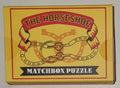 The Horseshoe Matchbox Puzzle by Professor Puzzle — metal horseshoe and ring disentanglement brainteaser in matchbox-style box, ages 8+